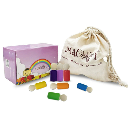 Colorful toy set with packaging and drawstring bag on a white background