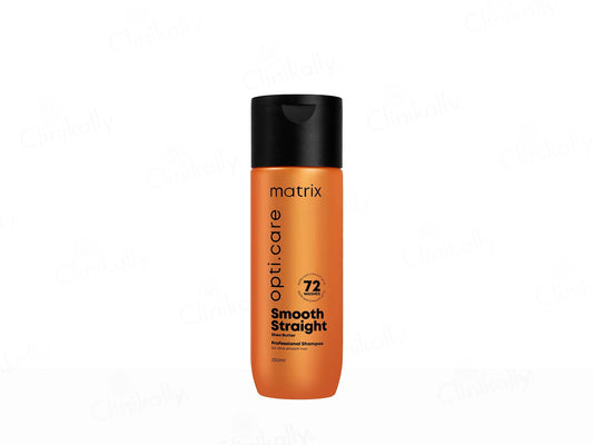 Orange shampoo bottle with black cap labeled 'matrix' on a white background