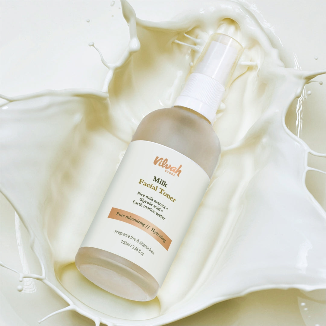 Vilvoh Milk Facial Toner bottle on a soft white fabric background