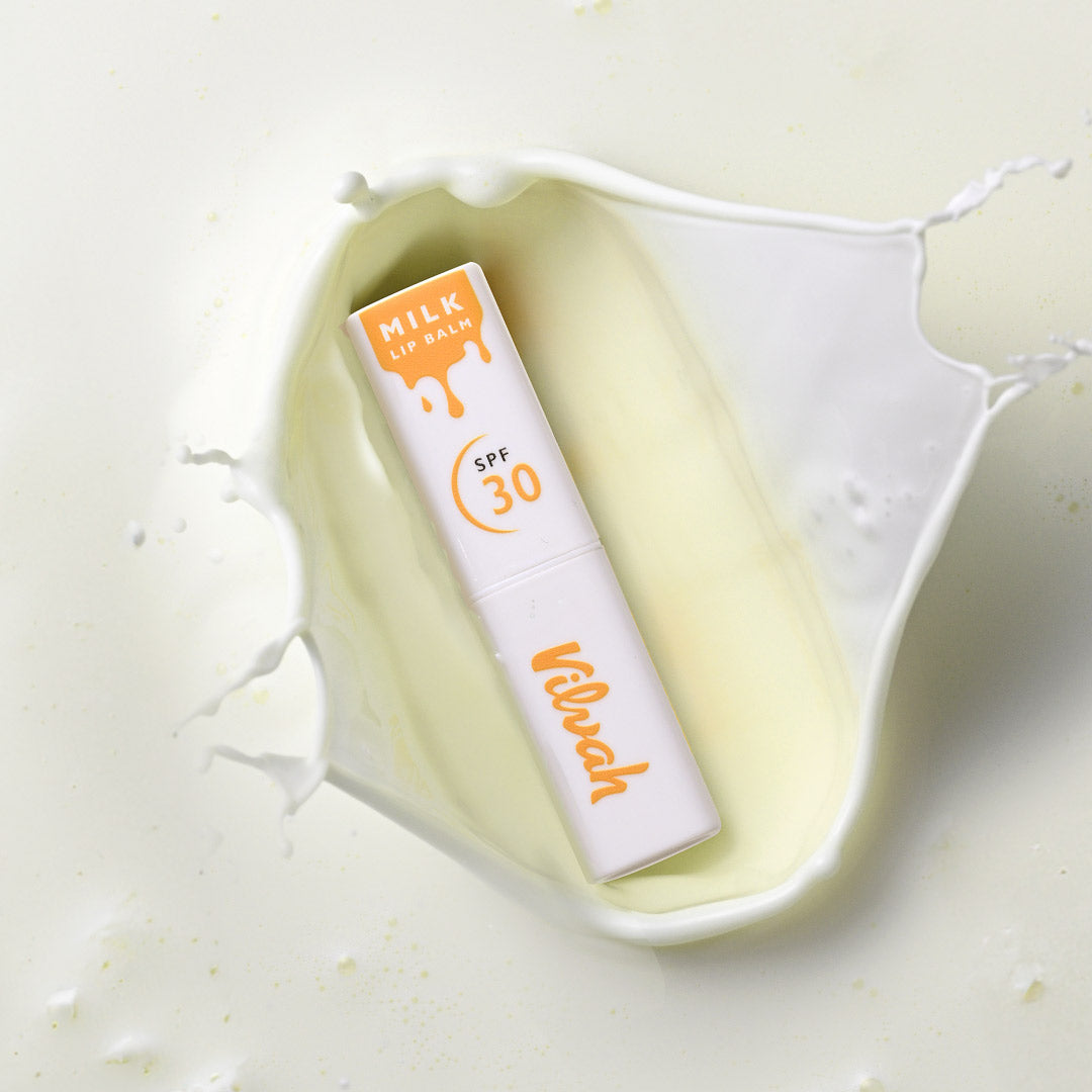Lip balm with SPF 30 on a white background