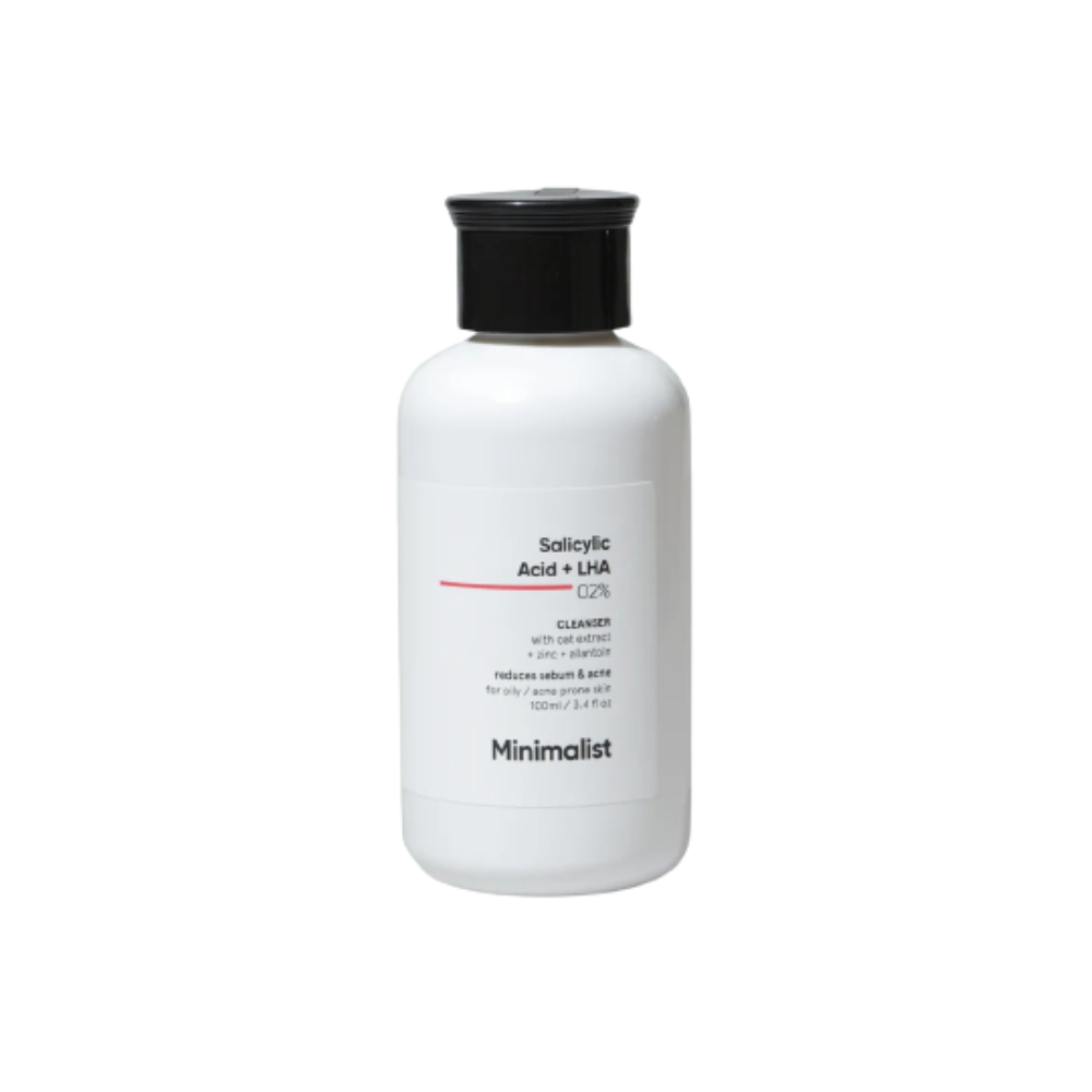 A white bottle of Minimalist 2% Salicylic Acid Face Wash with black cap and label displaying product details.