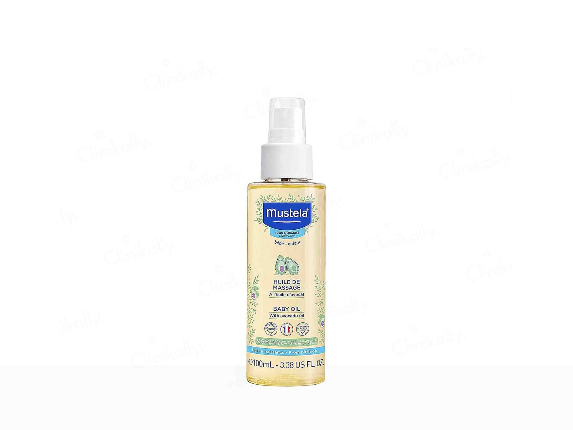Mustela baby oil spray bottle on a white background