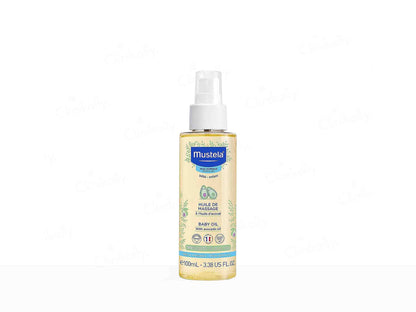 Mustela baby oil spray bottle on a white background