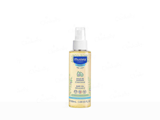 Mustela baby oil spray bottle on a white background