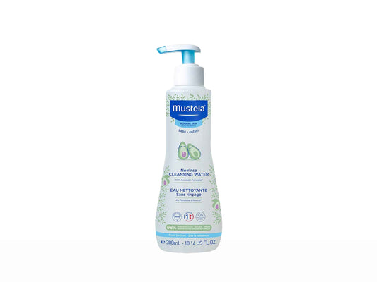 Mustela bottle of no-rinse cleansing water on a white background