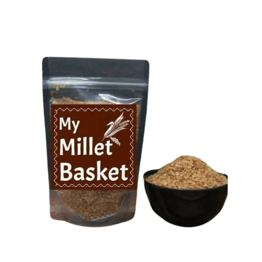 Bag of 'My Millet Basket' with a bowl of millet on a white background