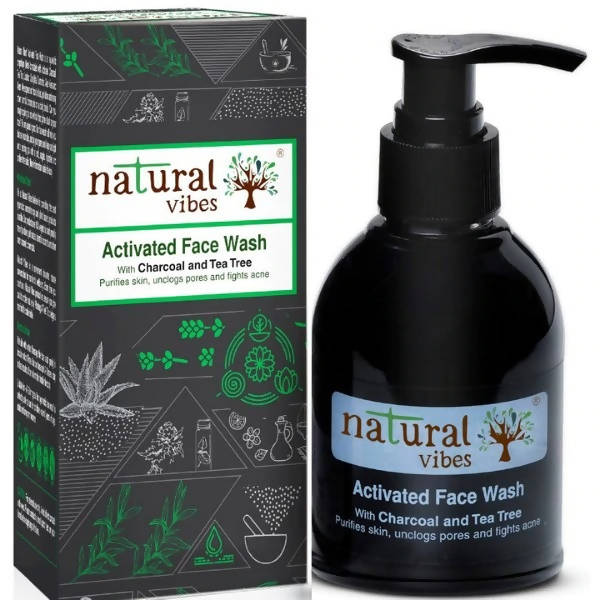 Black bottle and packaging of 'Natural Vibes' Activated Face Wash with charcoal and tea tree on a white background.
