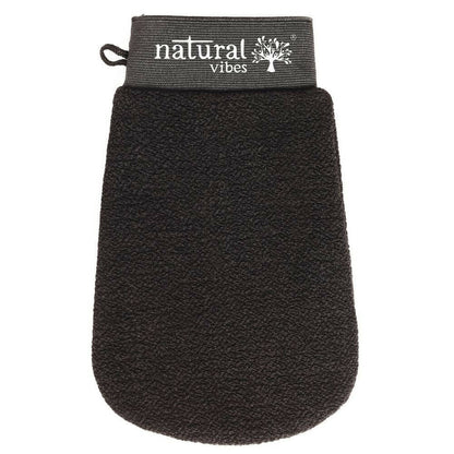 A black exfoliating and scrubbing glove with the brand 'Natural Vibes' written on the wrist area.