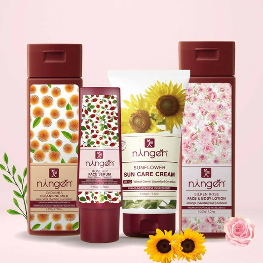 Ningen skincare products with floral designs on a pink background