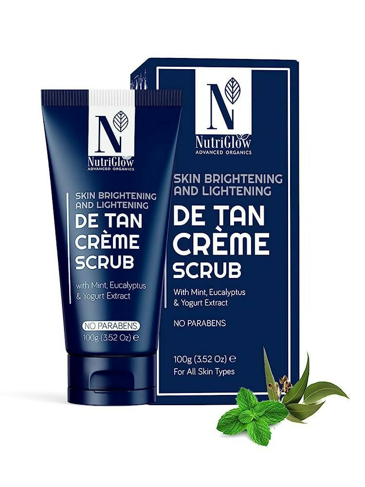 De Tan Creme Scrub packaging with blue and white design on a white background