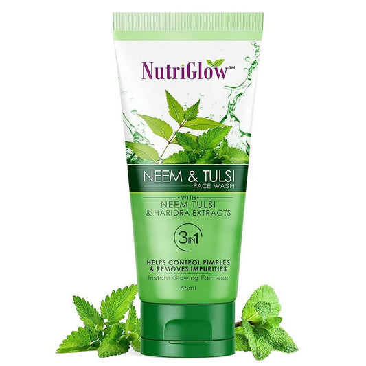 NutriGlow Neem & Tulsi face wash tube with green leaves on a white background