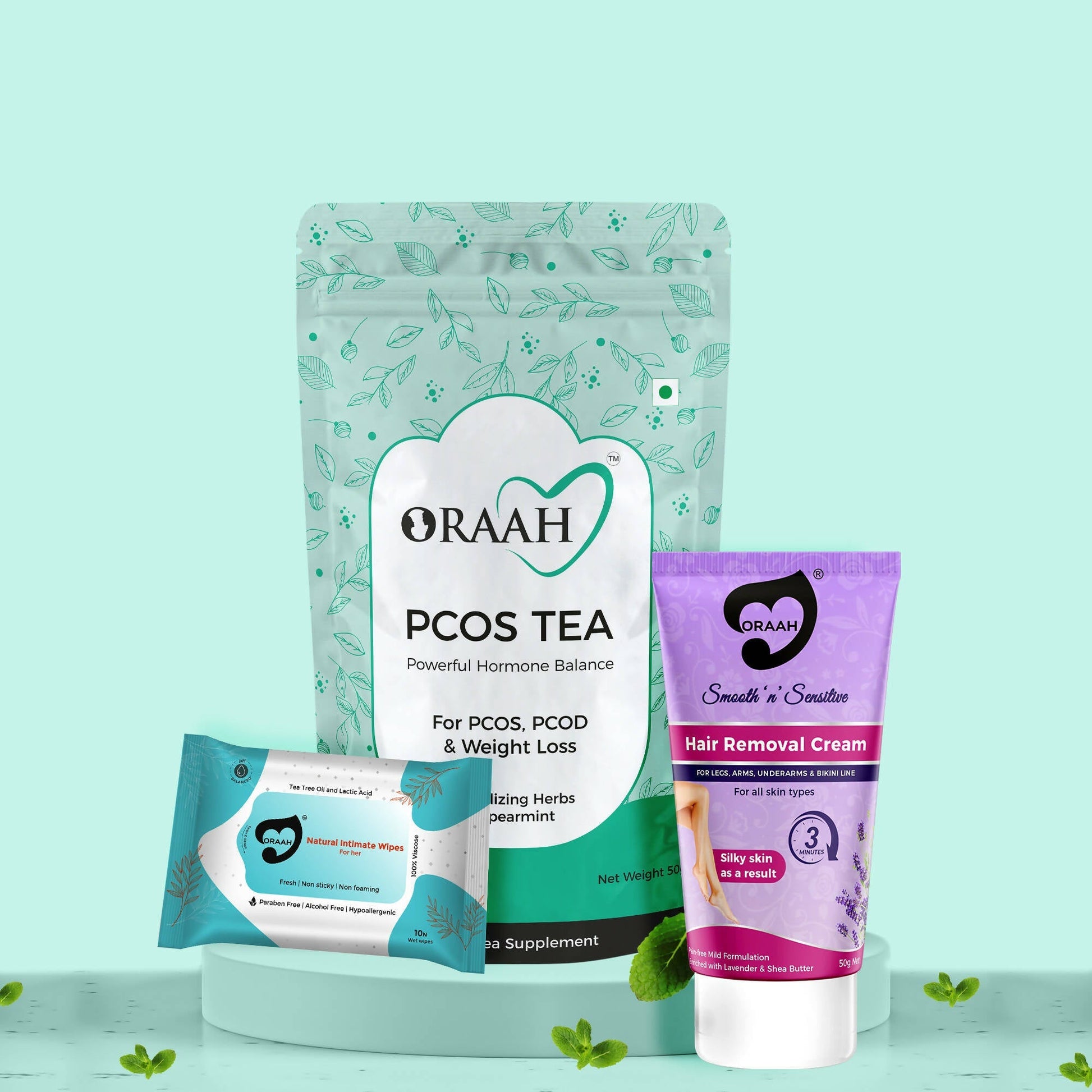 ORAAH PCOS Tea package with a hair removal cream on a light green background
