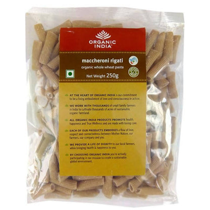 Packaged maccheroni rigati pasta with Organic India label on a white background