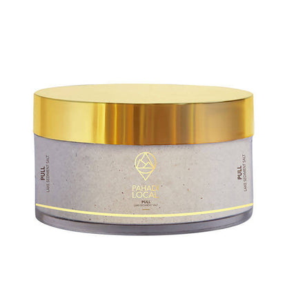 Jar with gold lid and concrete-like body on a white background