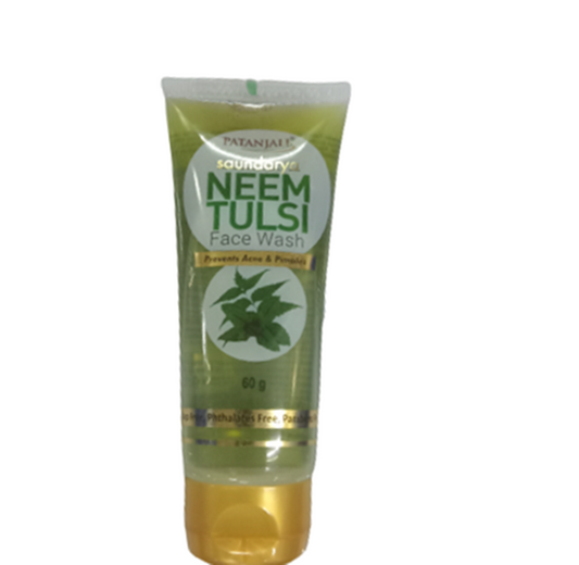 Patanjali Neem Tulsi Face Wash in a green and white tube with a gold cap.