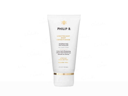 Tube of Philip B. hair product on a white background