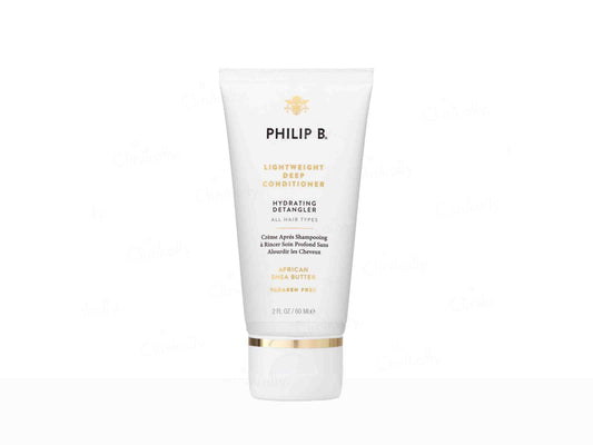 Tube of Philip B. hair product on a white background