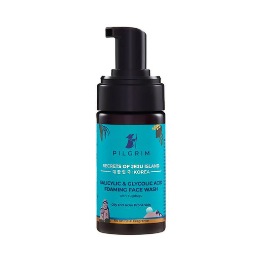 Foaming face wash bottle with blue label and black pump on white background