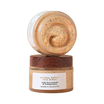 Two jars of Natural Papaya Face Scrub with wooden lids on a white background