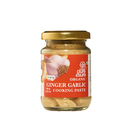 Jar of organic ginger garlic cooking paste with a red label on a white background