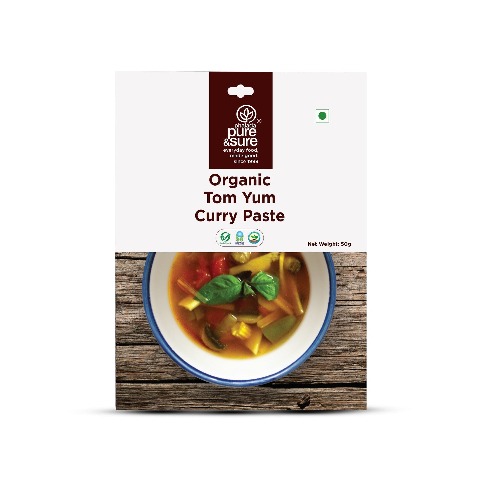 Package of pure & sure Organic Tom Yum Curry Paste on a white background