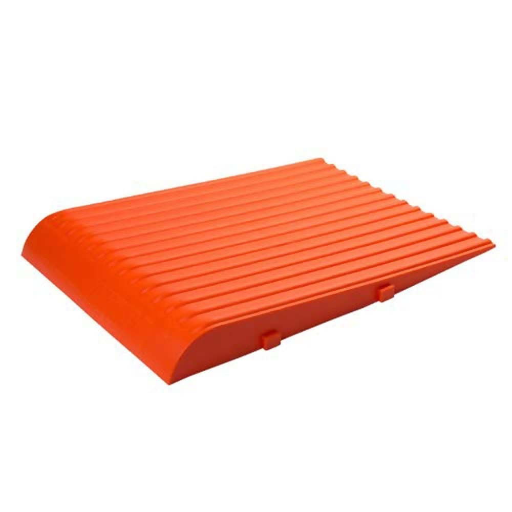 Orange plastic ramp on a white background