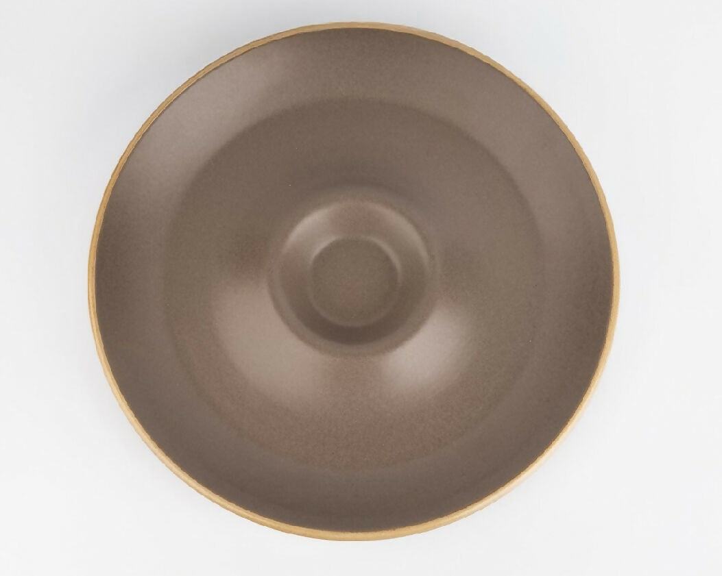 Brown ceramic bowl on a white background