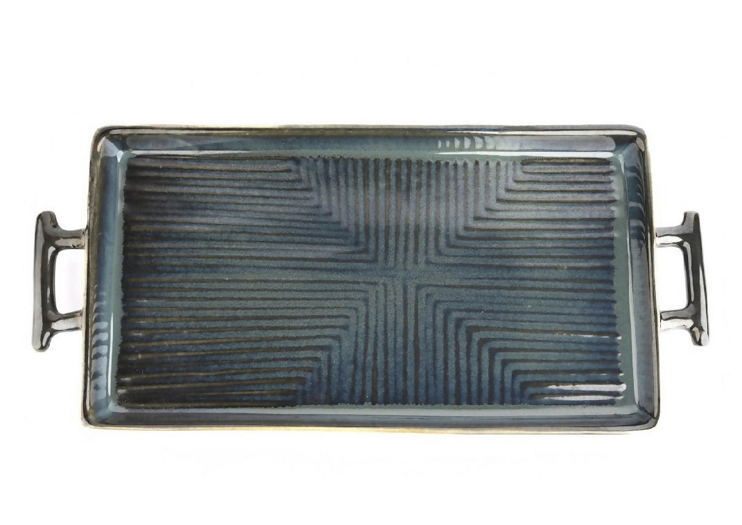 Rectangular ceramic baking dish with handles on a white background