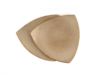 Two beige triangular coasters on a white background