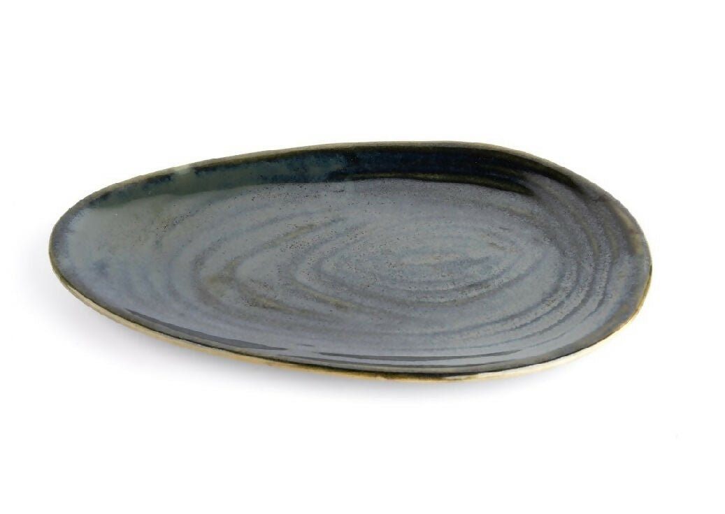 Black ceramic plate on a white background