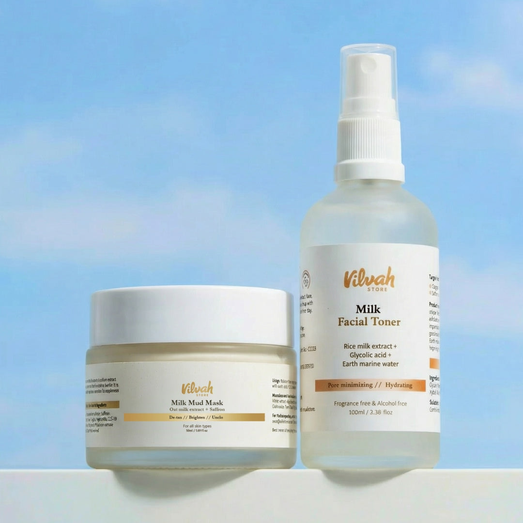 Vilvah skincare products including a mask, facial toner, and facial mist against a blue sky background.