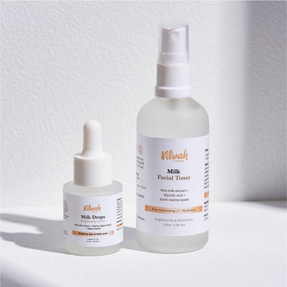 Two skincare products, 'Milk Drops' and 'Milk Facial Toner', from Vilvah on a light background.