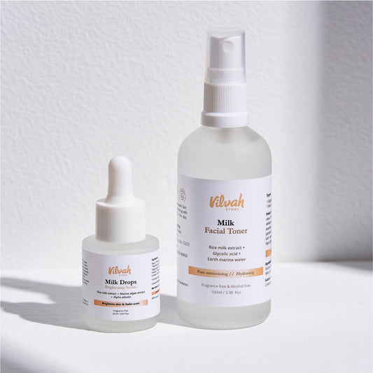 Two skincare products, 'Milk Drops' and 'Milk Facial Toner', from Vilvah on a light background.