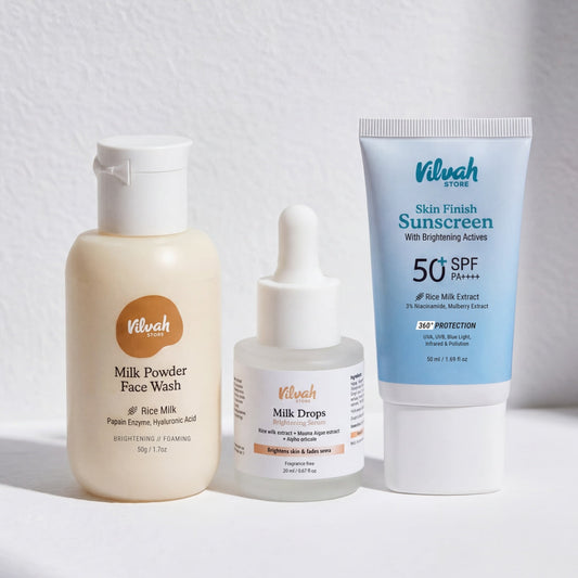 Vilvah skincare products including face wash, milk drops, and sunscreen on a white background