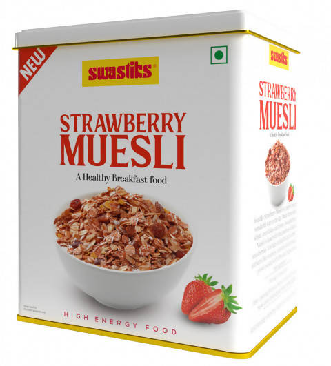 Box of Swastits Strawberry Muesli with a bowl of muesli and strawberries on a white background