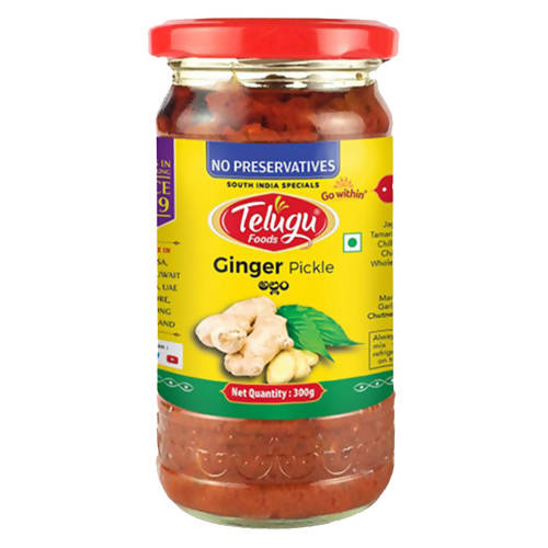 Jar of Telugu Ginger Pickle with a red lid on a white background