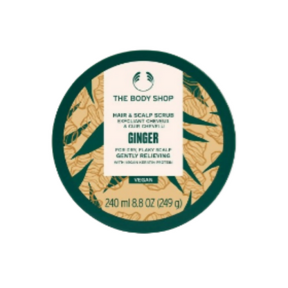 The Body Shop hair and scalp scrub container with ginger flavor on a white background