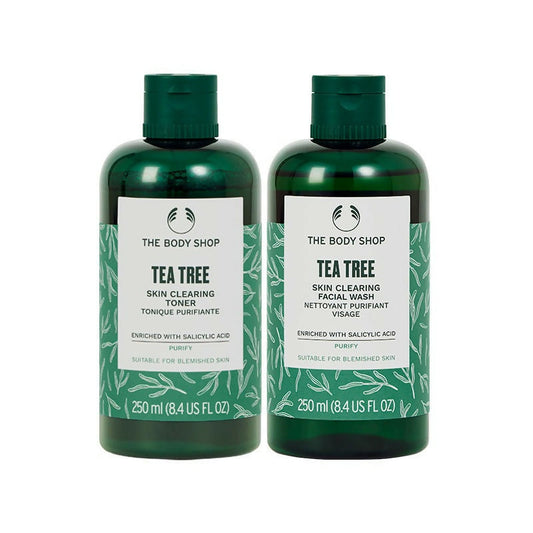 Two bottles of The Body Shop Tea Tree Skin Clearing products on a white background