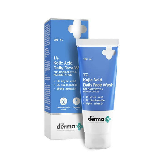 The image shows a tube and box of The Derma Co 1% Kojic Acid Daily Face Wash, with product information and branding visible.