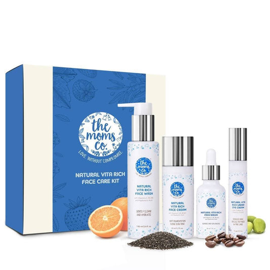 The moms co. natural vita rich face care kit with various skincare products and a box on a white background.
