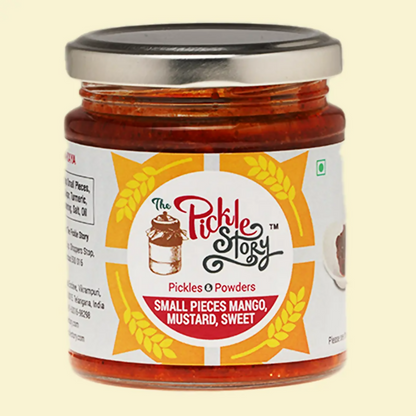 Jar of 'The Pickle Story' pickles with a yellow label on a beige background