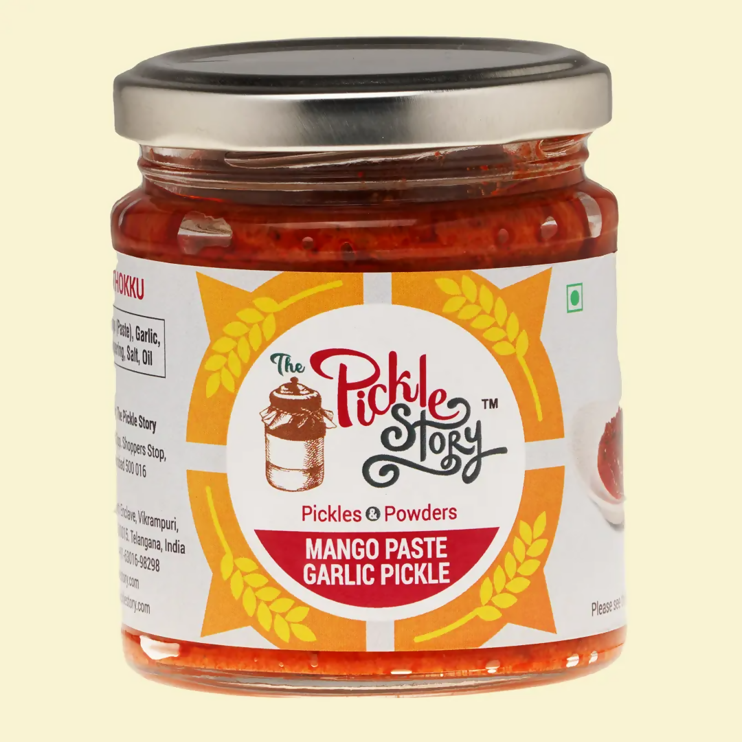 Jar of 'The Pickle Story' Mango Paste Garlic Pickle on a beige background