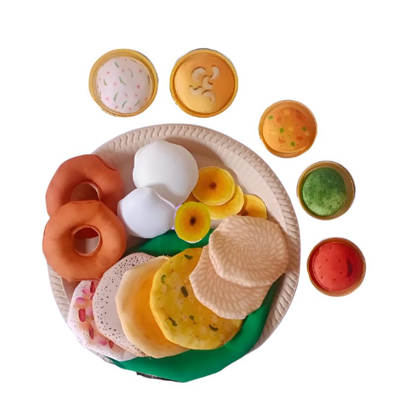 Assorted toy food items on a white background