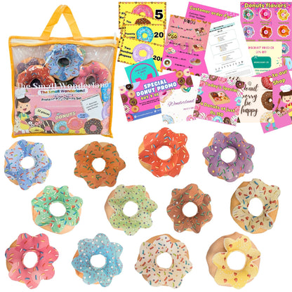Set of colorful donut-shaped toys with packaging and accessories on a white background