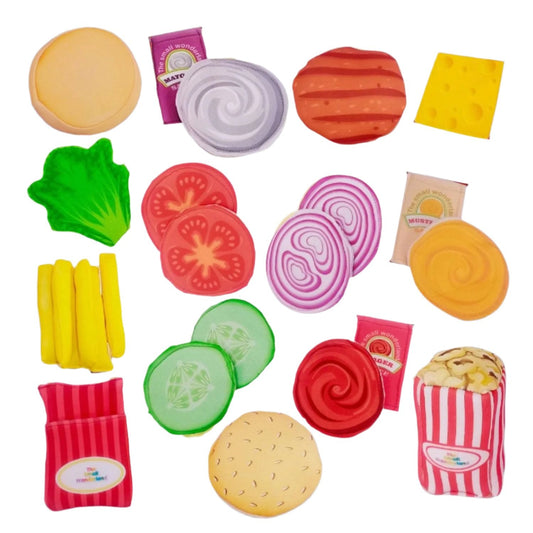 Assorted toy food items on a white background