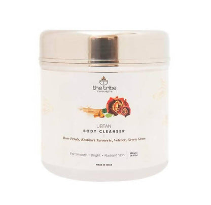 A packaged Ubtan body cleanser by The Tribe Concepts, featuring an image of rose petals and spices on the label.