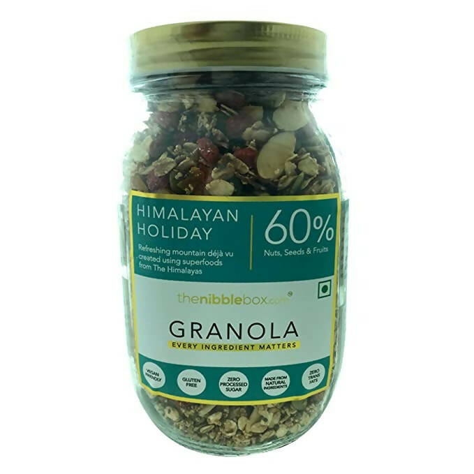 Jar of Himalayan Holiday Granola with a green label on a white background