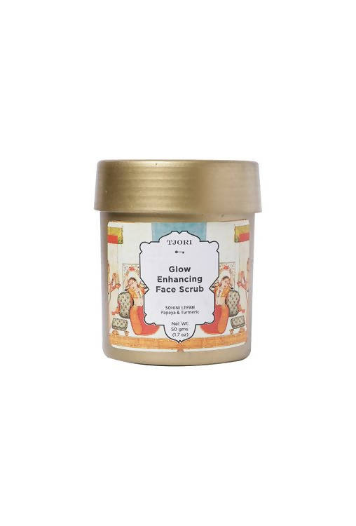 Jar of 'Glow Enhancing Face Scrub' with a gold lid on a white background