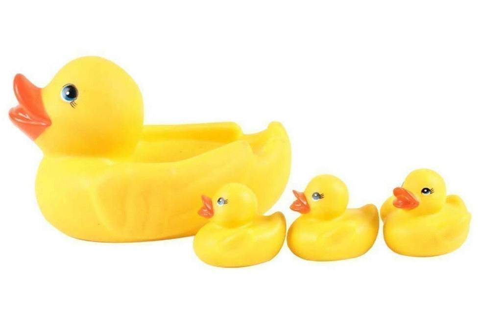 Set of yellow rubber ducks on a white background