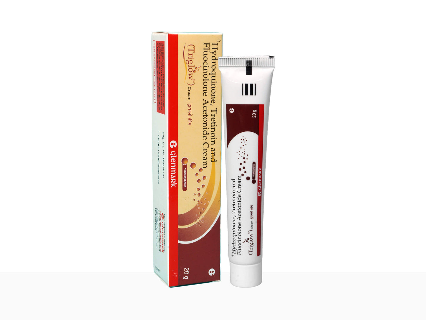 Tube of cream and its packaging on a white background